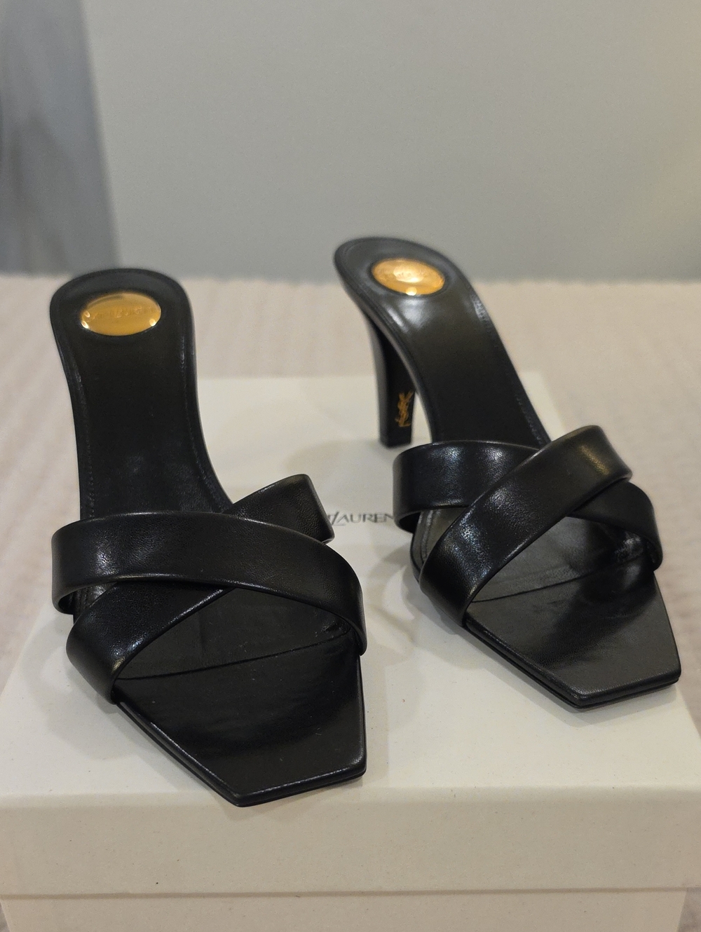 Yves Saint Laurent Black Leather Crisscross Square-Toe Mules with Gold Medallion